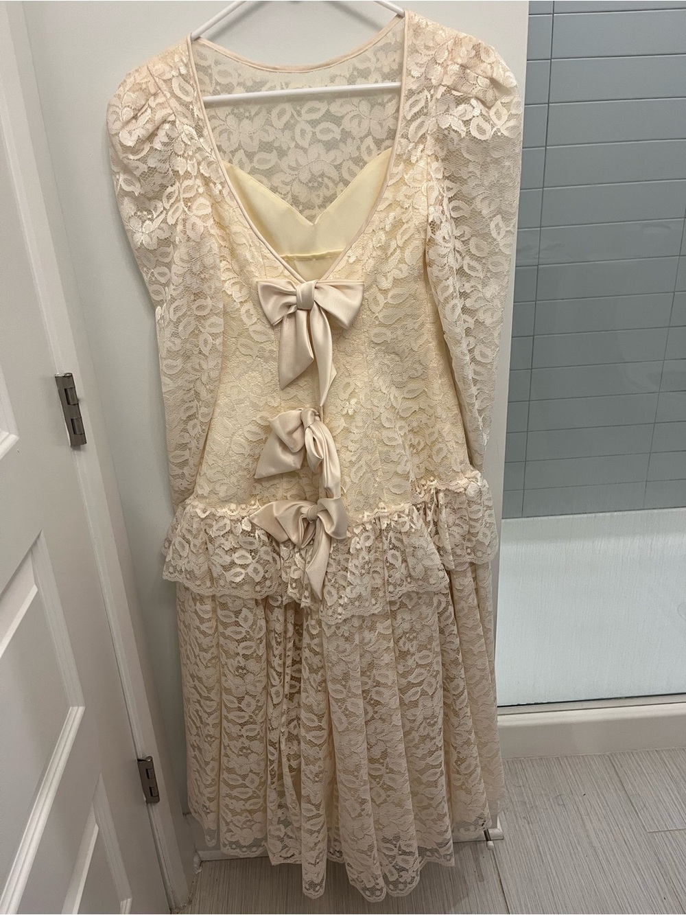 Elegant Cream Lace Long-Sleeve Peplum Dress